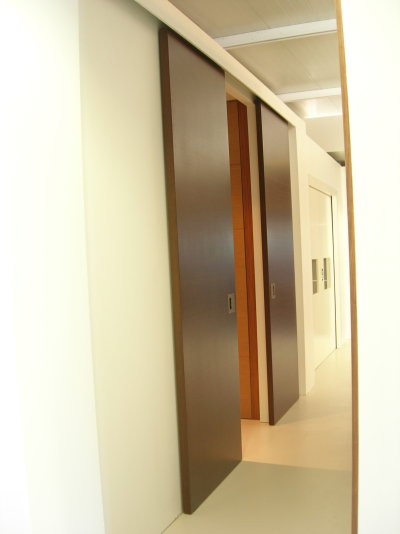Porte Double Coulissante exterieur mur